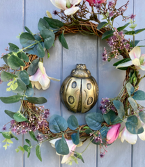 Ladybird Door Knocker in ANTIQUE BRASS